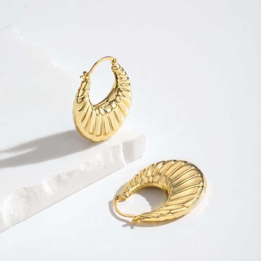 Thick gold hoop earrings