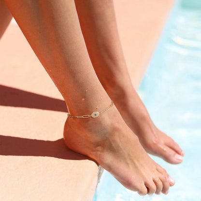 Close-up of Dainty 14k Gold Plated Layering Evil Eye Anklets Set - Oval Evil Eye and Satellite Chain