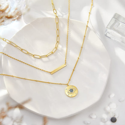 14K Gold Layered Evil Eye Necklace showcasing its stylish layering design