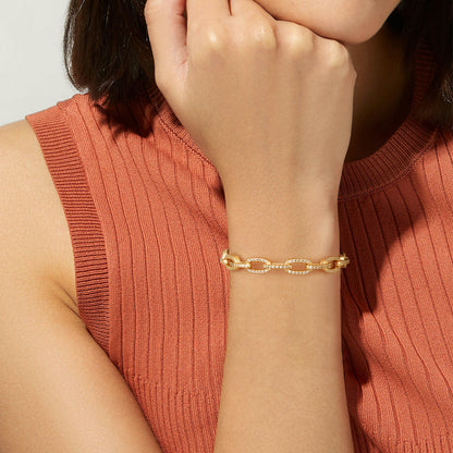 Woman Wearing 14K Gold Square Bracelet