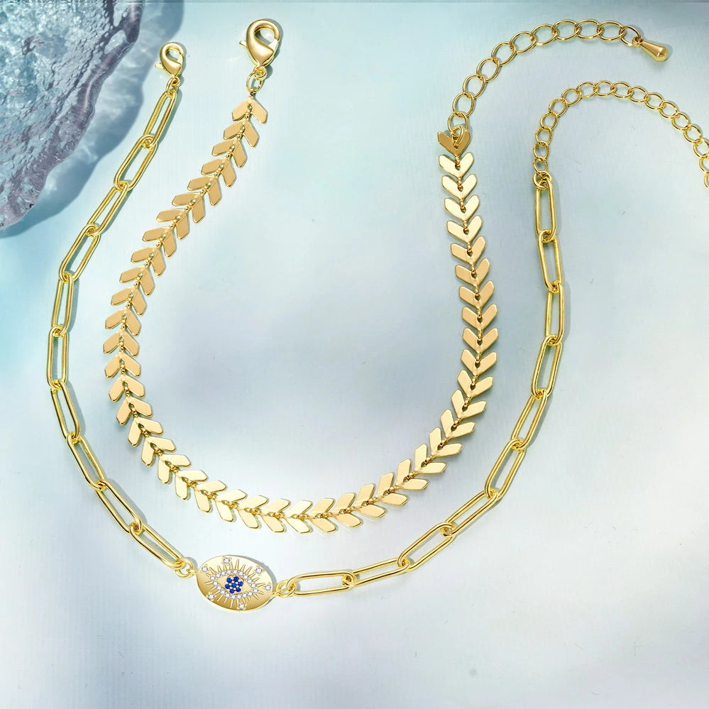 Stylish Oval Evil Eye and Fishbone Chain Anklets Set in gold-plated finish