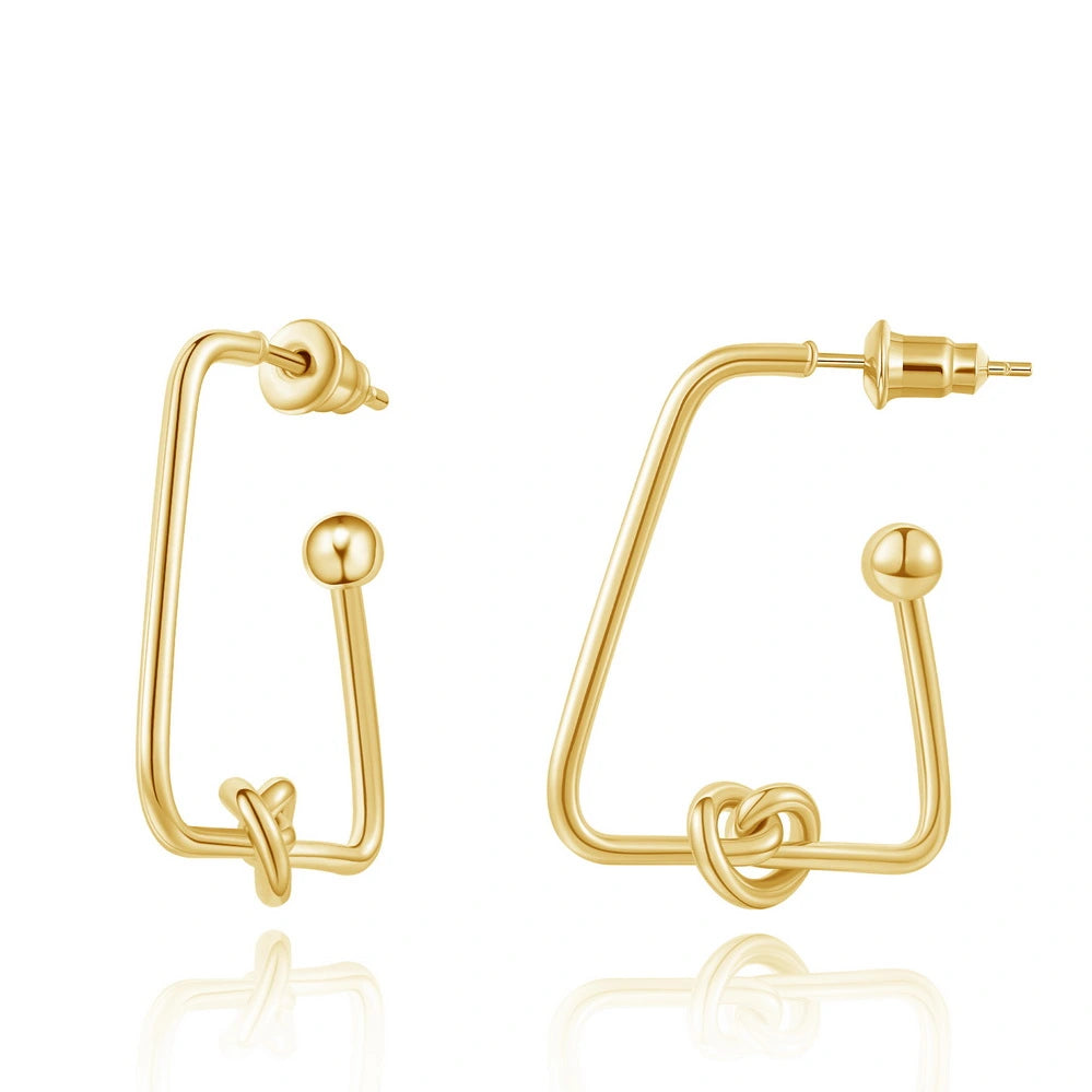 14K Gold Geometric Twisted Huggie Hoops Earrings on a white background