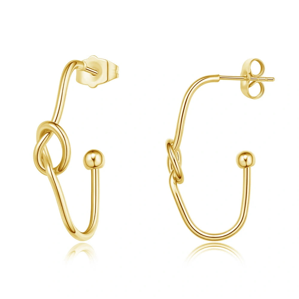 14K Gold Geometric Twisted Huggie Hoops Earrings on a white background