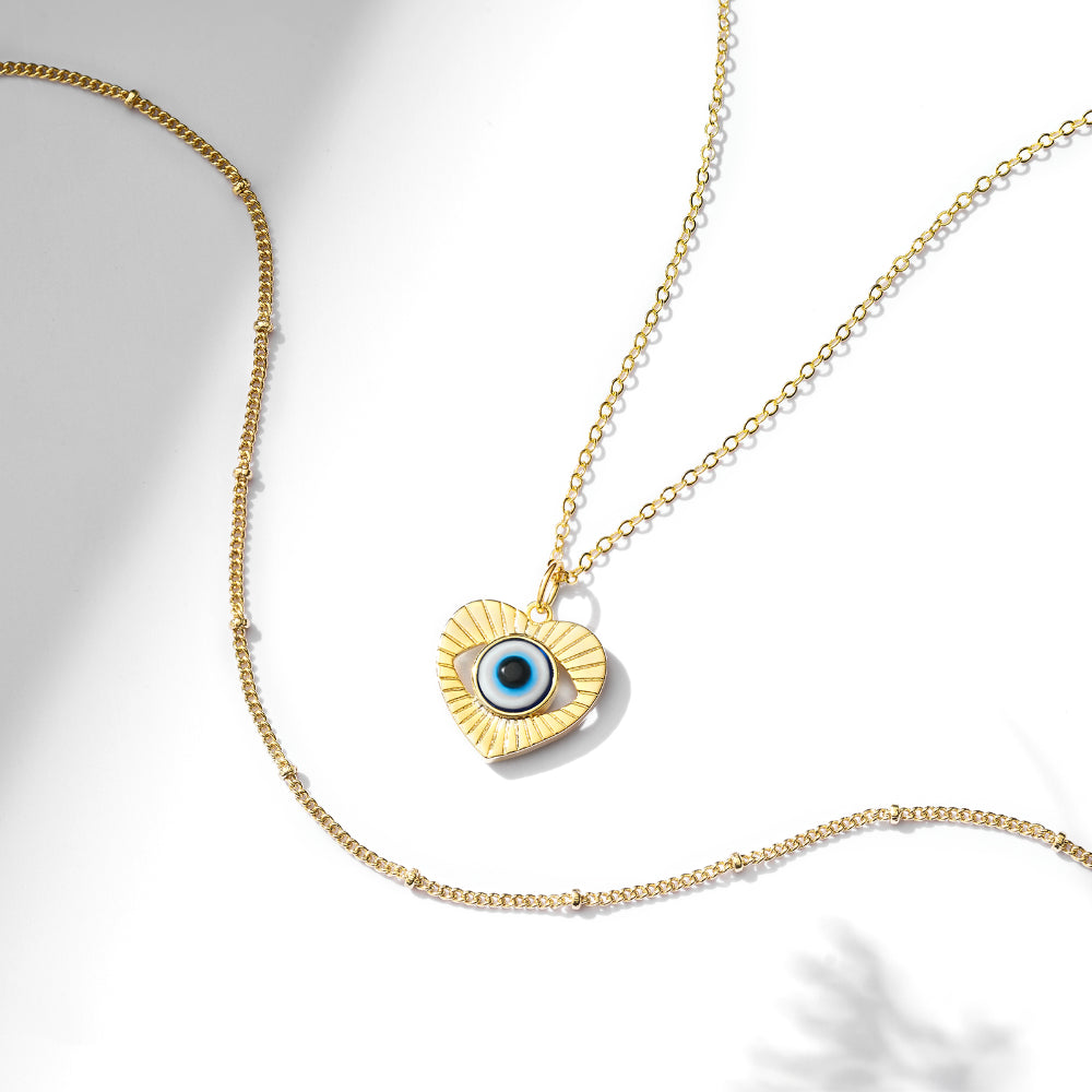 Chic 14K Gold Layered Evil Eye Necklace with Heart-Shaped Pendant and Satellite Chain