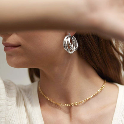 Close-up of Thick Gold Chunky Hoop Earrings